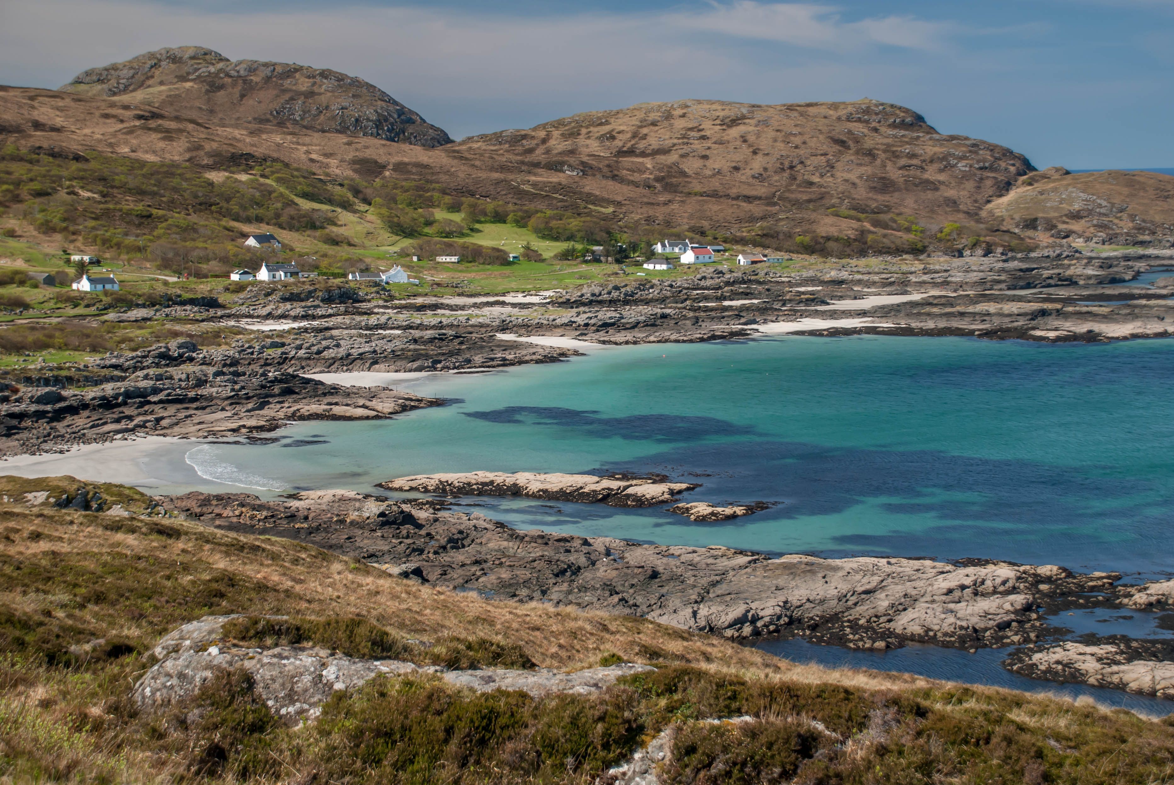 Sanna Bay, Ardnamurchan, with white-sand beaches and turquoise water backed by croft houses and hills